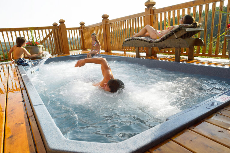 boy swimming in pool