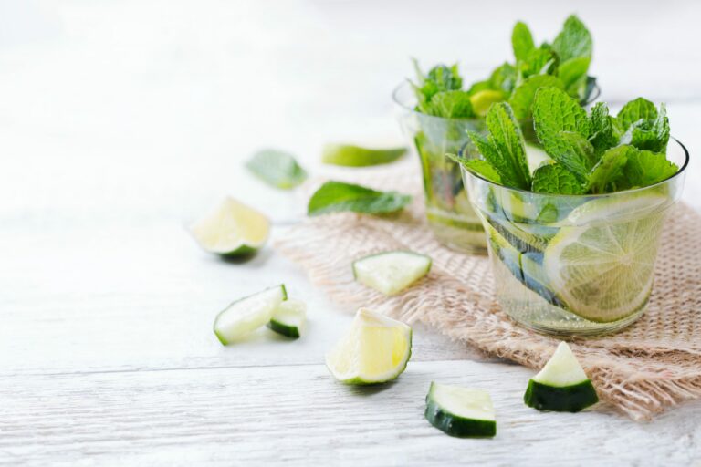 Cucumber lime mint fresh infused water detox drink cocktail lemonade