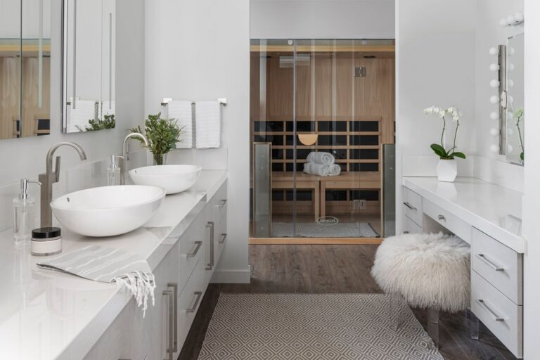 Indoor Jacuzzi infrared saunas installed in a modern bathroom.