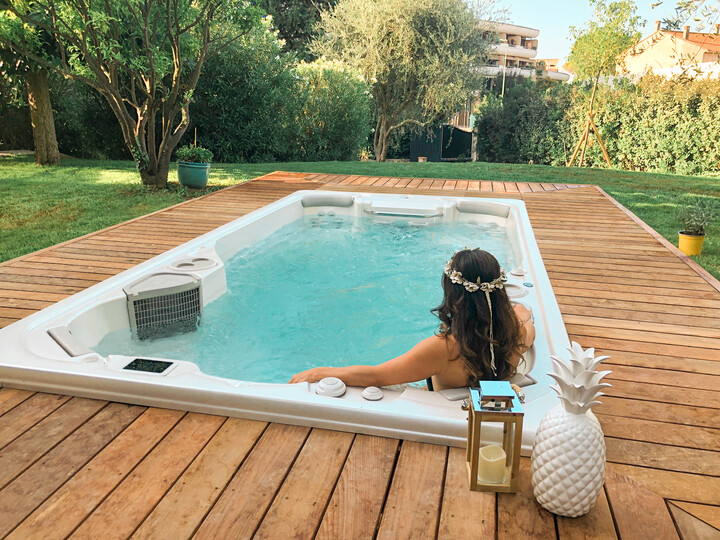 women relaxing in a hydropool swim spa - swim spa service